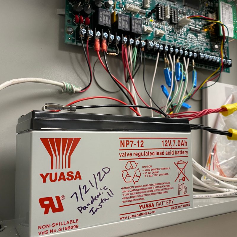 Fire alarm panel and battery backup installation by Onora Systems