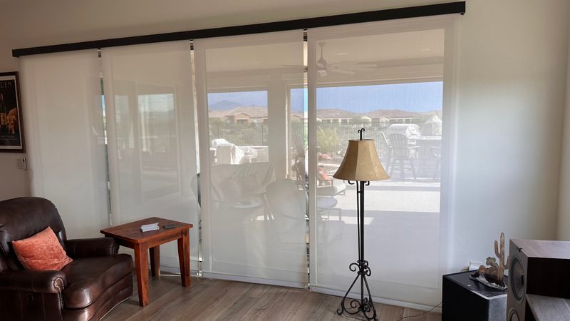 Motorized window shades with Tucson mountain views