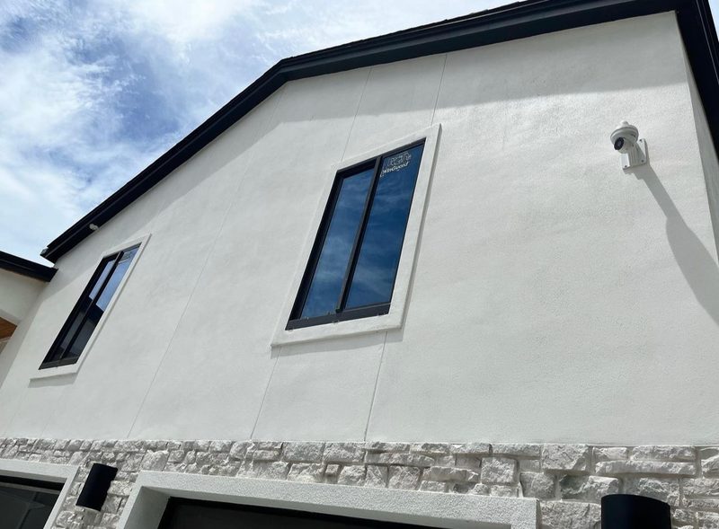 Security camera mounted on stucco home in Vail, Arizona