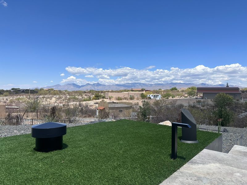 Outdoor speakers on rooftop patio with Tucson mountain views, installed by Onora Systems