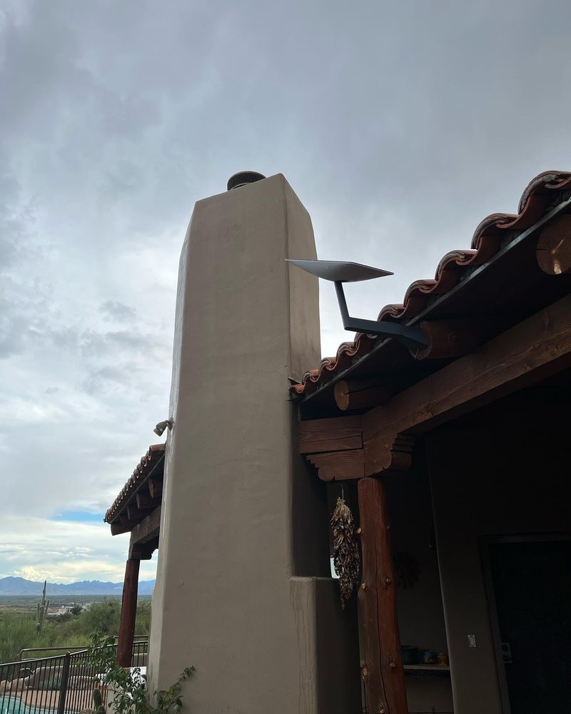 Starlink satellite dish installation on Tucson rooftop