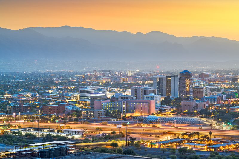 Tucson, Arizona cityscape at sunset with Catalina Mountains