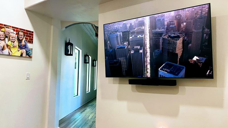 Professional TV wall mount with hidden cabling in a Tucson home